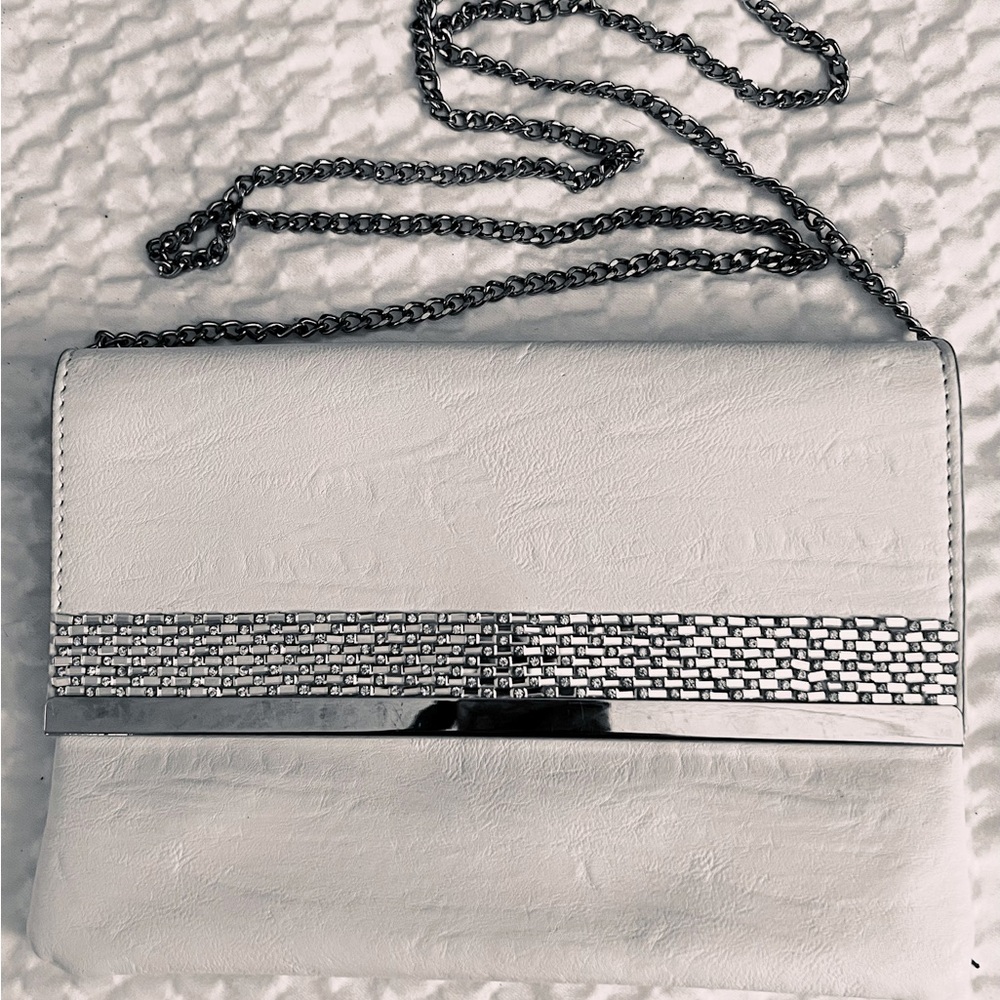 Slightly used Colette by Colette Hayman leather chalk white crossbody bag.